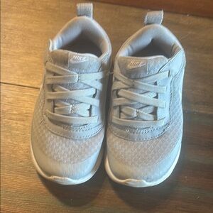 Nike Gray Mesh Sneakers with Cushioned Soles and strap